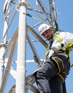 A worker works at height on a construction site.